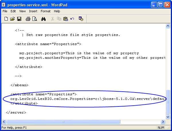 Wordpad editing the JBoss properties service file.